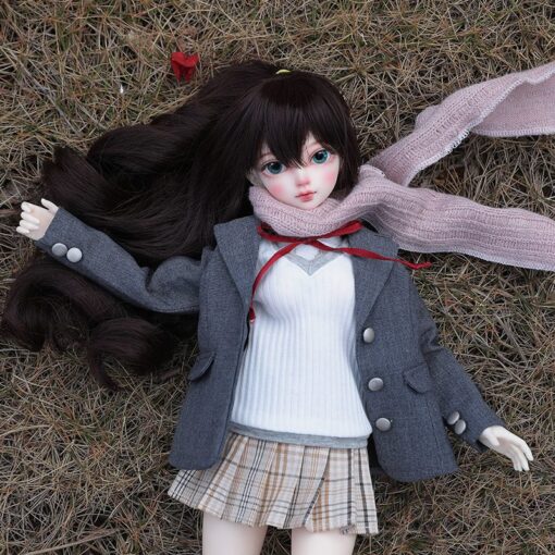 Locha fairy doll lying on grass